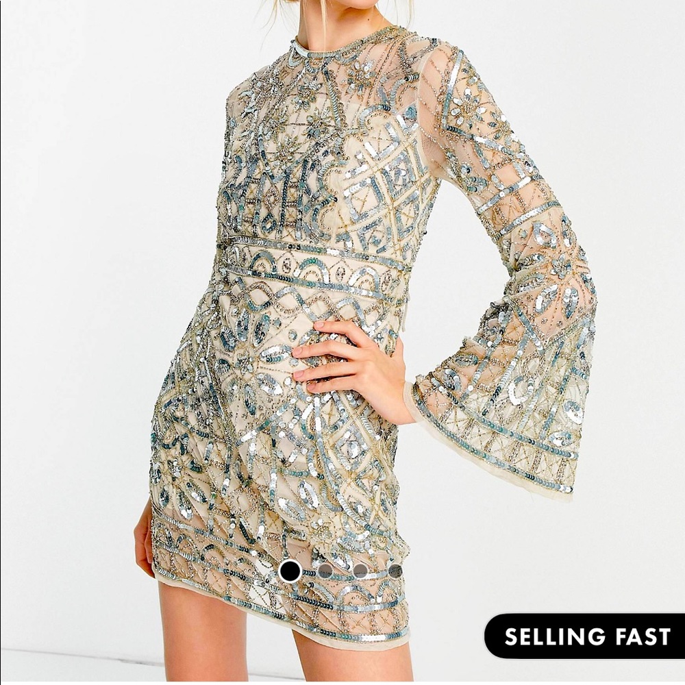Gorgeous beaded dress. Worn once for rehearsal dinner. So many compliments!